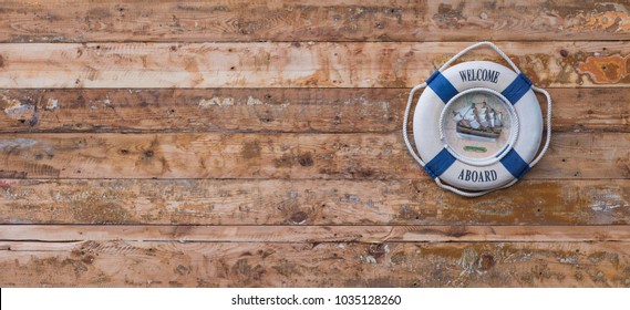 Life Ring On A Wooden Wall