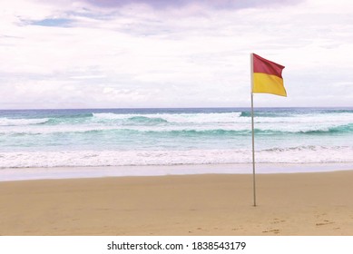 Life Saver Flag On The Beach