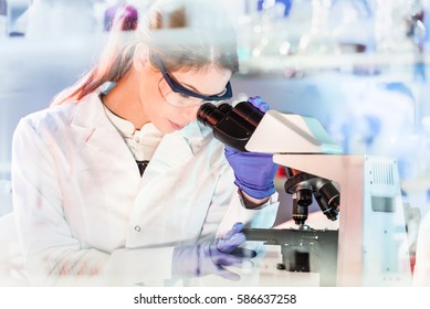 Life Science Female Researcher Microscoping In Scientific Genetic Laboratory. Healthcare And Biotechnology.