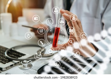 Life Scientists Researching In Laboratory. Focused Female Life Science Professional Pipetting Solution Into The Glass Cuvette. Healthcare And Biotechnology Concept.