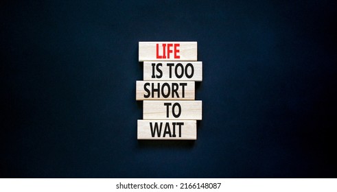 Life Is Short To Wait Symbol. Concept Words Life Is Too Short To Wait On Wooden Blocks On A Beautiful Black Table Black Background. Copy Space. Business Motivational Life Or Wait Concept.