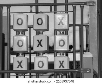 Life Size Tic Tac Toe Game In School Playground With X's And O's On Large Turnable Blocks Three X's In Diagonal Line Black And White Image Horizontal Format Winner Love And Kisses Valentines 