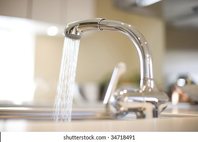 LIFE STYLE-a Kitchen Faucet With Water Flowing