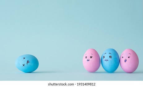 Life Tragedy. Loss Grief. Compassion Mourning. Conceptual Composition. Sad Shocked Devastated Color Egg Crowd Watching Unconscious Victim Lying Isolated On Blue Copy Space Background.