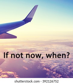 Life, travel and inspirational quote with phrase "if not now, when?" with blurry background - wings of an airplane in the sky, retro style