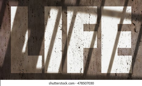 Life Written On A Wall With Jail Bars Shadow