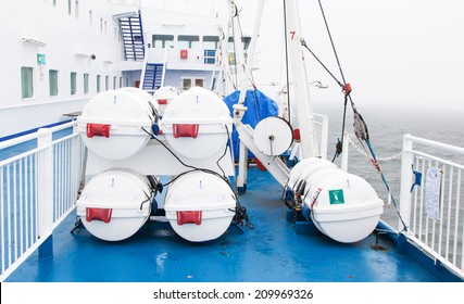 Lifeboats (barrel) by deck of a cruise ship