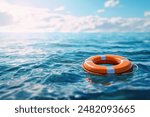 Lifebuoy floating in blue sea