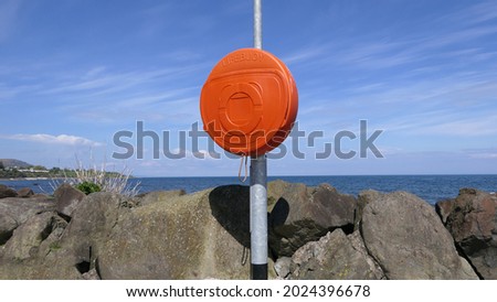 Lifebuoy at Glenariff Waterfoot Beach and Glen Co Antrim Northern Ireland 