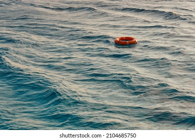 A lifebuoy on the surface of a waving sea