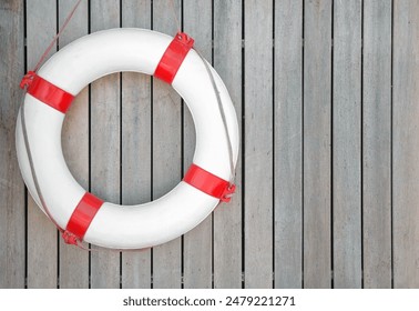 A lifebuoy on a wooden wall. - Powered by Shutterstock