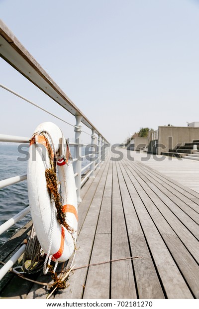 Lifebuoy Ring on wood\
bridge