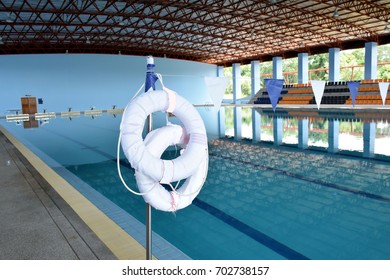 lifebuoy,swimming pool and grandstand background - Powered by Shutterstock