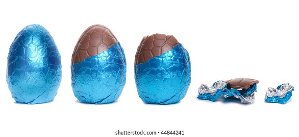 The Lifecycle In Stages Of A Blue Foil Covered Chocolate Easter Egg Isolated Against White Background.