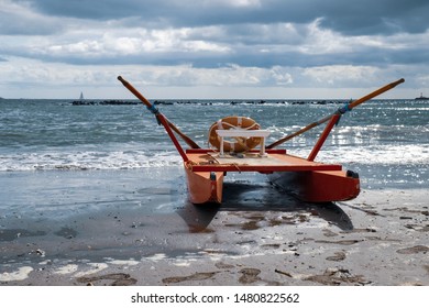 A Lifeguard Catamaran On The Adriatic In Porto Garibaldi.Travel Italy.After Storm