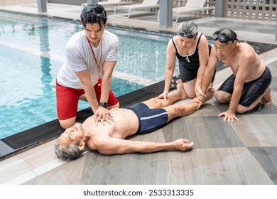 lifeguard first AID help with cardiac massage elderly man has drown at poolside,friends or family worried beside,accidents,drowning,first AID help,basic life support - Powered by Shutterstock