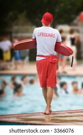 Lifeguard On Duty In Swimming Pool