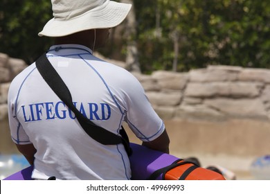 Lifeguard On Duty In Swimming Pool