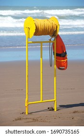 Lifeguard Rescue Bouy With Yellow Rope On The Beach