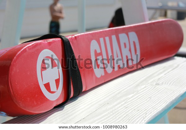 Lifeguard Rescue tube\
on Pool Lifeguard\
Stand