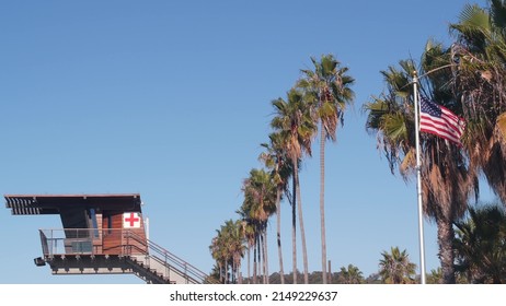 Lifeguard Stand Or Life Guard Tower Hut, Surfing Safety On California Beach, USA. Summer Pacific Ocean Aesthetic. Rescue Station, Coast Lifesavers Wachtower Or House, Palm Trees In La Jolla, San Diego