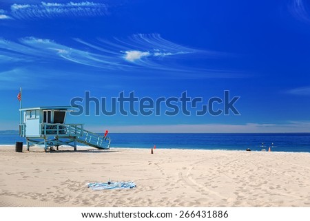 Lifeguard station with american flag on Hermosa beach, Californi