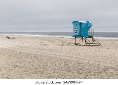 a lifeguard station at the foggy Stinson beach at the morning - Powered by Shutterstock