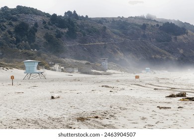 a lifeguard station at the foggy Stinson beach at the morning - Powered by Shutterstock