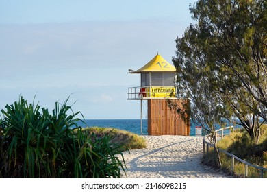 Lifeguard tower on the beach at sunrise.