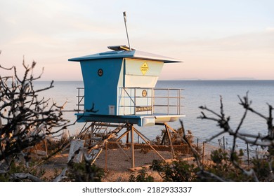 A lifeguard tower at sunset in El Matador Beach, Malibu, California - Powered by Shutterstock