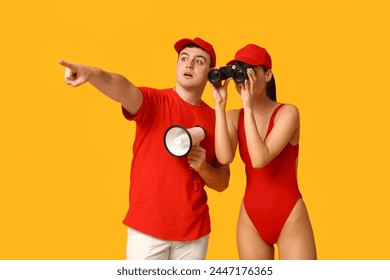 Lifeguards with binoculars and megaphones spotted something on yellow background