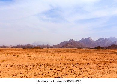 Lifeless Hot Desert With Mountains In Egypt, Africa