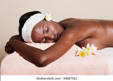 lifestyle, african american woman having a massage treat at the spa
