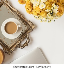 Lifestyle Blog, Social Media Concept. Flatlay Female Minimal Workspace With Laptop Computer, Coffee Cup And Beautiful Flowers Bouquet On White Table. Top View, Business, Work Stylish Composition.