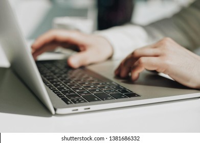 Lifestyle education student. Businessman work on laptop for project. Millennial at home office looking for job on notebook. Unrecognizable man using modern portable computer.