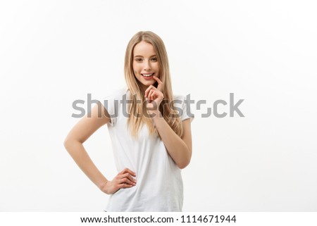 Lifestyle and Emotional Concept: Charming beautiful shy caucasian woman. hands hold face with excited smile emotion.