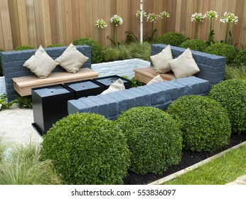 A Lifestyle Garden Combining Outdoor And Indoor Living With Seating Area