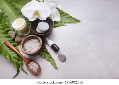 Lifestyle and Healthy Concept. Spa setting for massage treatment on gray background

