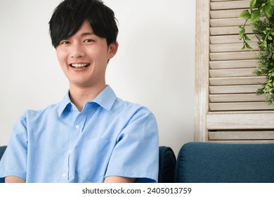 Lifestyle image of a young man in casual clothes - Powered by Shutterstock