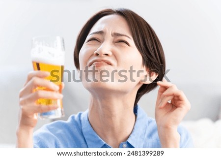 Similar – Image, Stock Photo Portrait of a young man with a beer glass in his hand