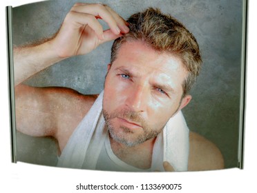 Lifestyle Isolated Portrait Of Attractive Worried And Concerned Caucasian Man Looking At Bathroom Mirror Finding Gray Hair Frustrated In Unhappy Aging Getting Grey Hairs And Body Care Concept