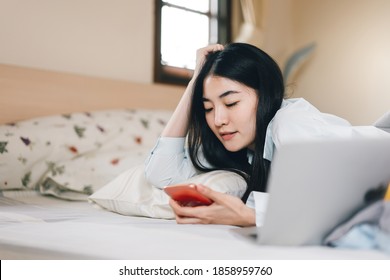 Lifestyle With Modern Technology Concept. Young Adult Lonely Single Woman Using Smartphone In The Moring For Social Message App Chat With Friend For Mental Health.