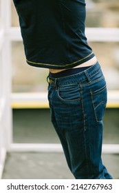 Lifestyle Photo Of A Handsome Man In Denim Jeans  Close Up