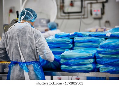 Lifestyle Reportage Photography Of A Pie And Pastry Wholesale Bakery Factory Worker Making Sheets Of Puff Pastry