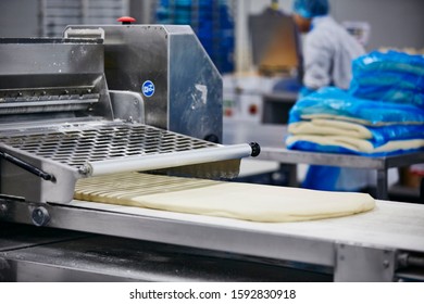 Lifestyle Reportage Photography Of A Pie And Pastry Wholesale Bakery Factory, Manufacture Of Puff Pastry Sheets