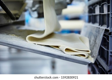 Lifestyle Reportage Photography Of A Pie And Pastry Wholesale Bakery Factory, Manufacture Of Puff Pastry Sheets