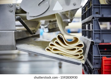 Lifestyle Reportage Photography Of A Pie And Pastry Wholesale Bakery Factory, Manufacture Of Puff Pastry Sheets