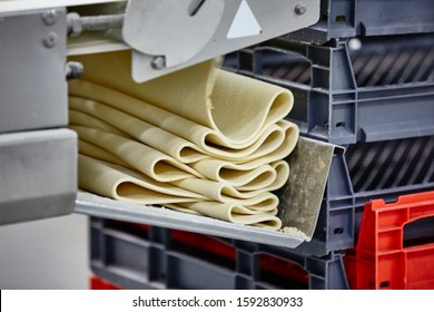 Lifestyle Reportage Photography Of A Pie And Pastry Wholesale Bakery Factory, Manufacture Of Puff Pastry Sheets