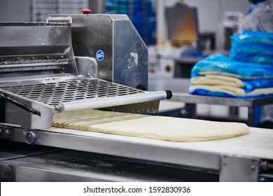 Lifestyle Reportage Photography Of A Pie And Pastry Wholesale Bakery Factory, Manufacture Of Puff Pastry Sheets