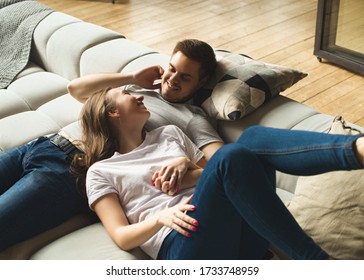 Lifestyle slow living consept at home with couple young men and woman in room sitting and hugging, stop rushing, enjoying life, happiness is in small things,  - Shutterstock ID 1733748959
